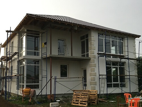 Отделка фасада дома штукатуркой в Жодино